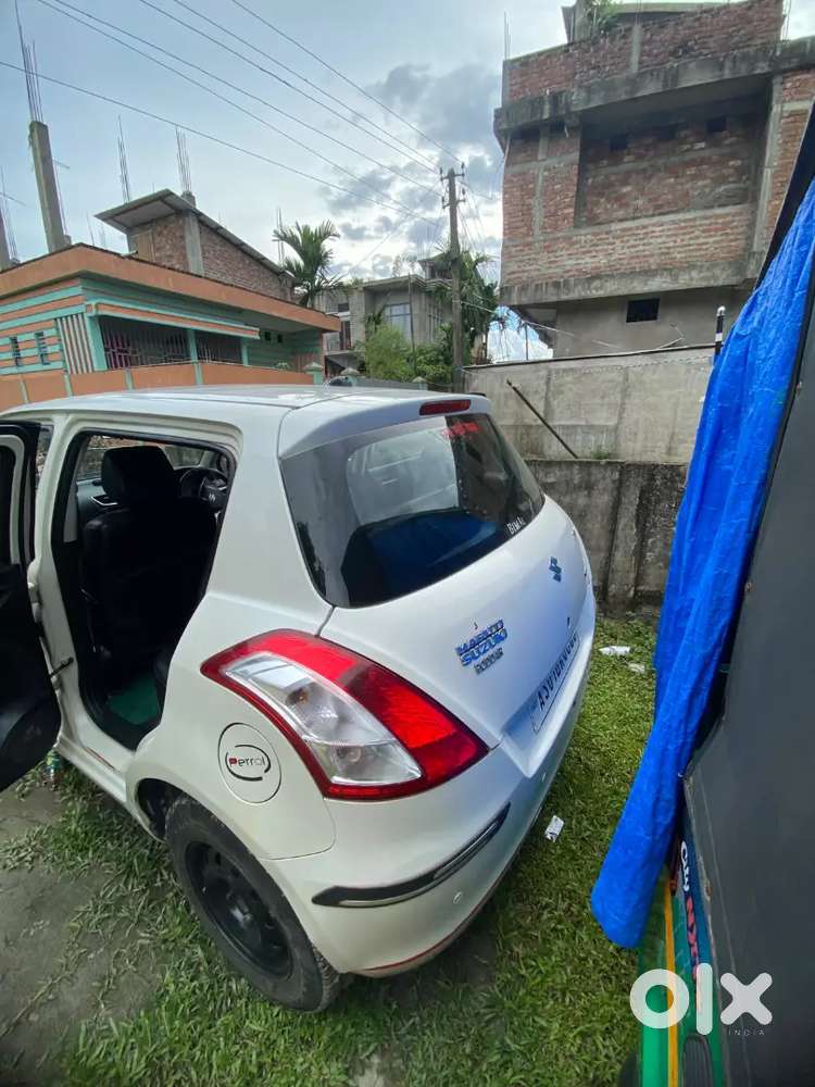 Maruti Suzuki Swift Lxi 2014