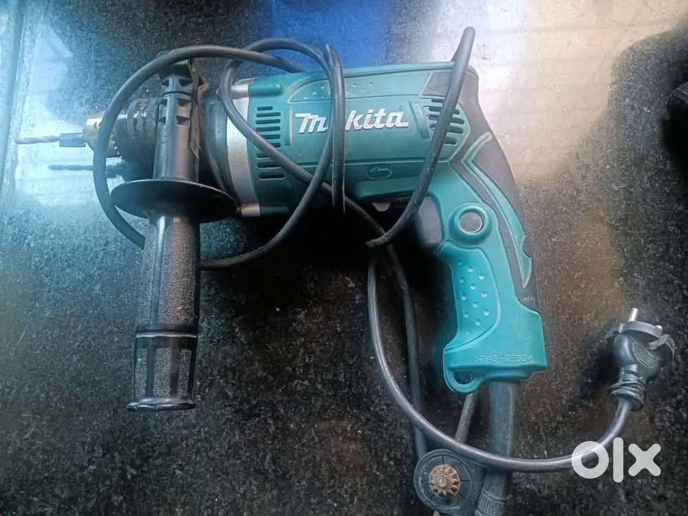 Makita HP 1630 drill machine