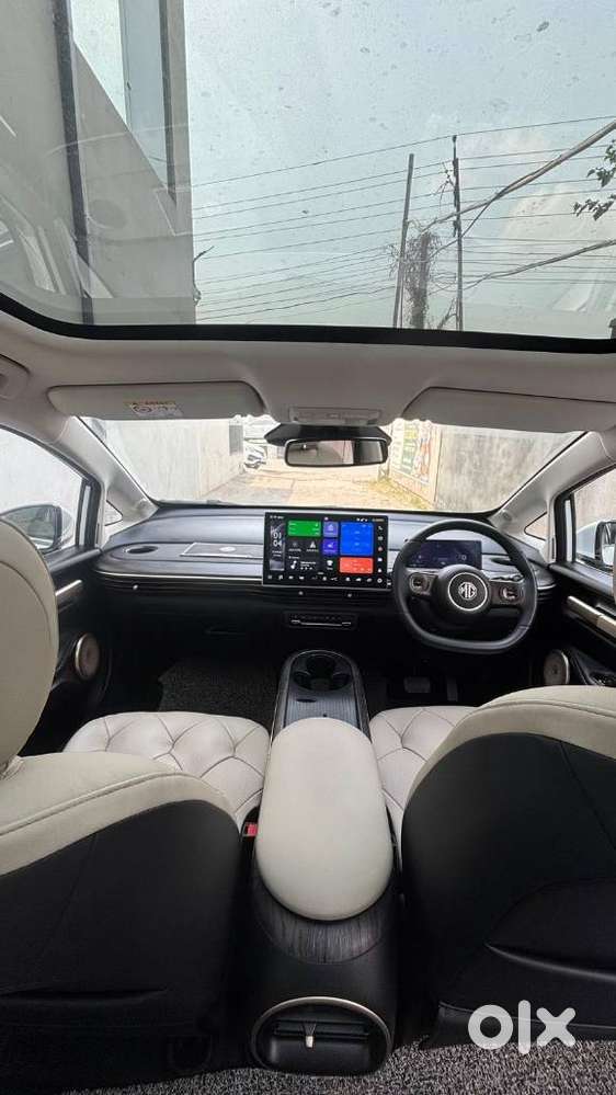 Mg Windsor Ev, 2025, Petrol