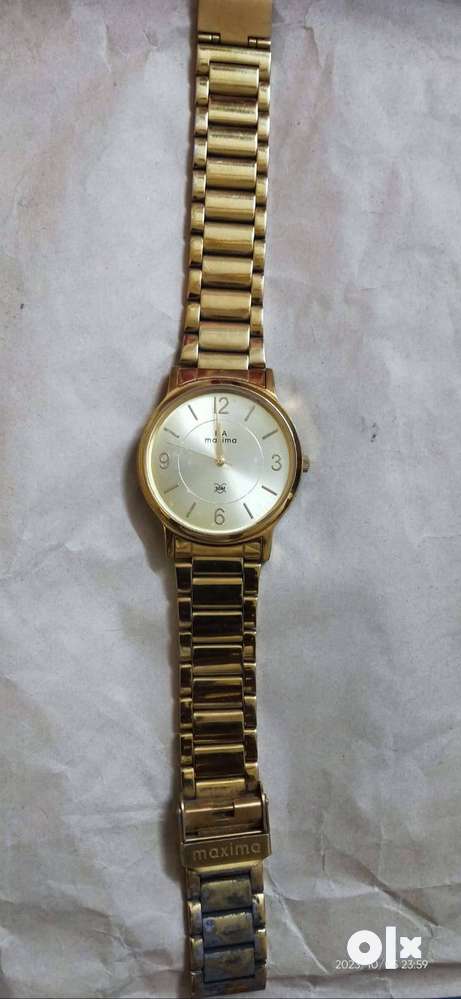 Maxima gold clearance watch