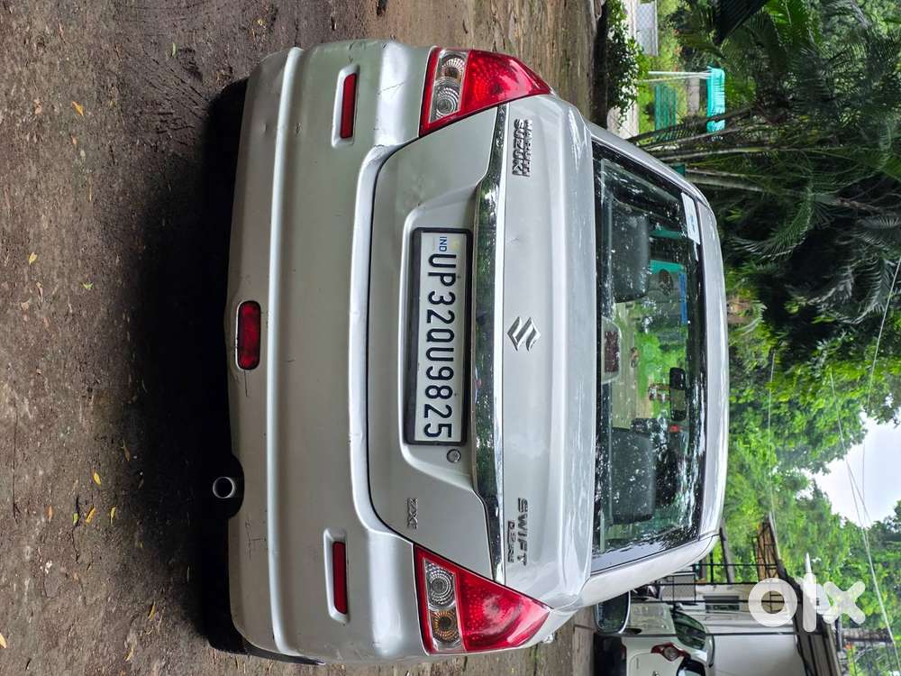 Maruti Suzuki Dzire-2010-first Owner-silky Silver