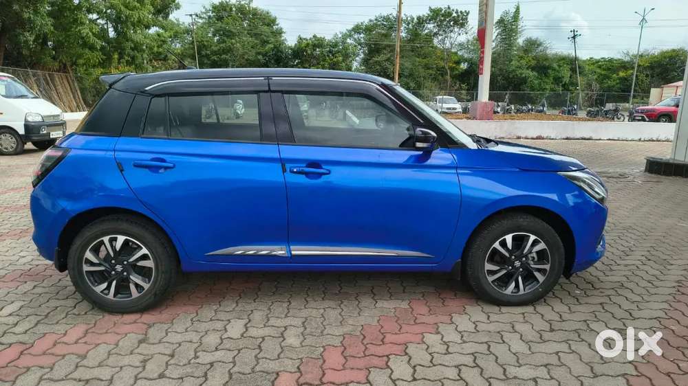 Maruti Suzuki Swift Zxi Plus Amt Dual Tone  2024 Petrol