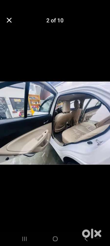 साफ सुथरी गाड़ी है वाइट कलर नया वाला मॉडल है डीजल