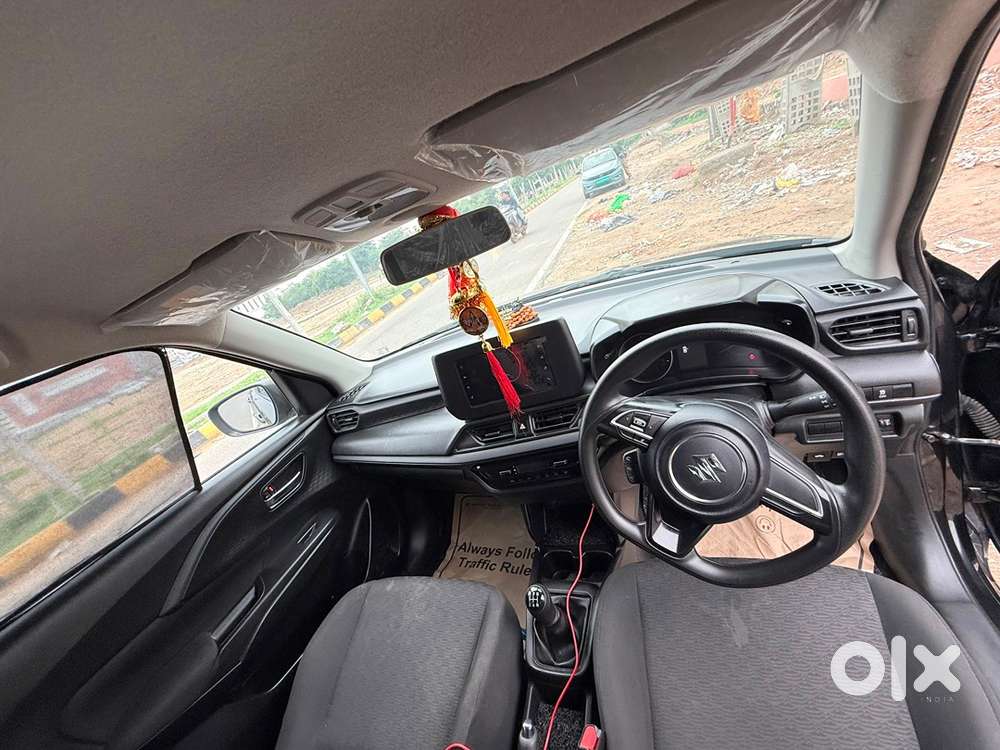 Maruti Suzuki Swift Vxi 2026