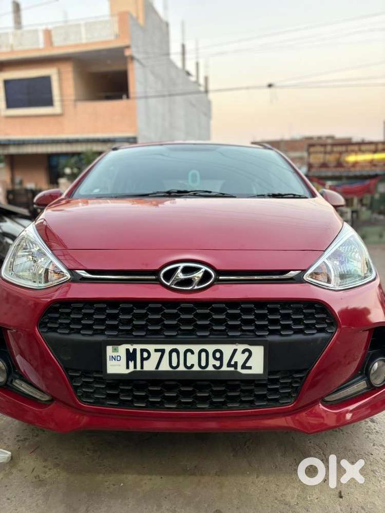 2018 Hyundai Grand I10 Red   First Owner  56,399 Km  ₹3,60,000