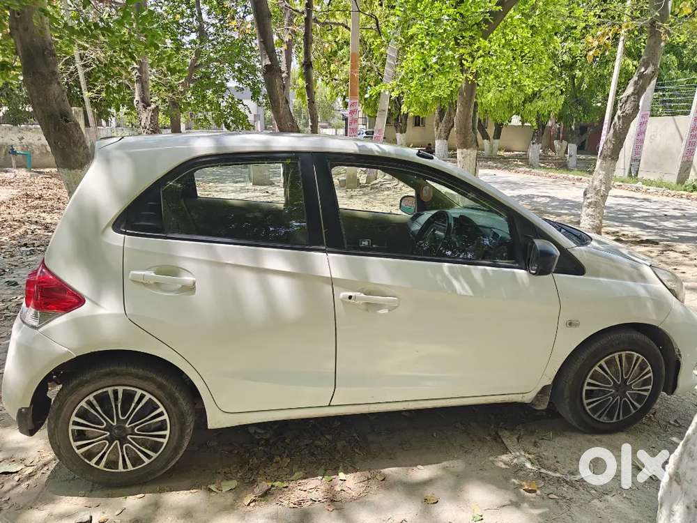 White Honda Brio 2017 With Sequential Cng On Paper In Good Condition.