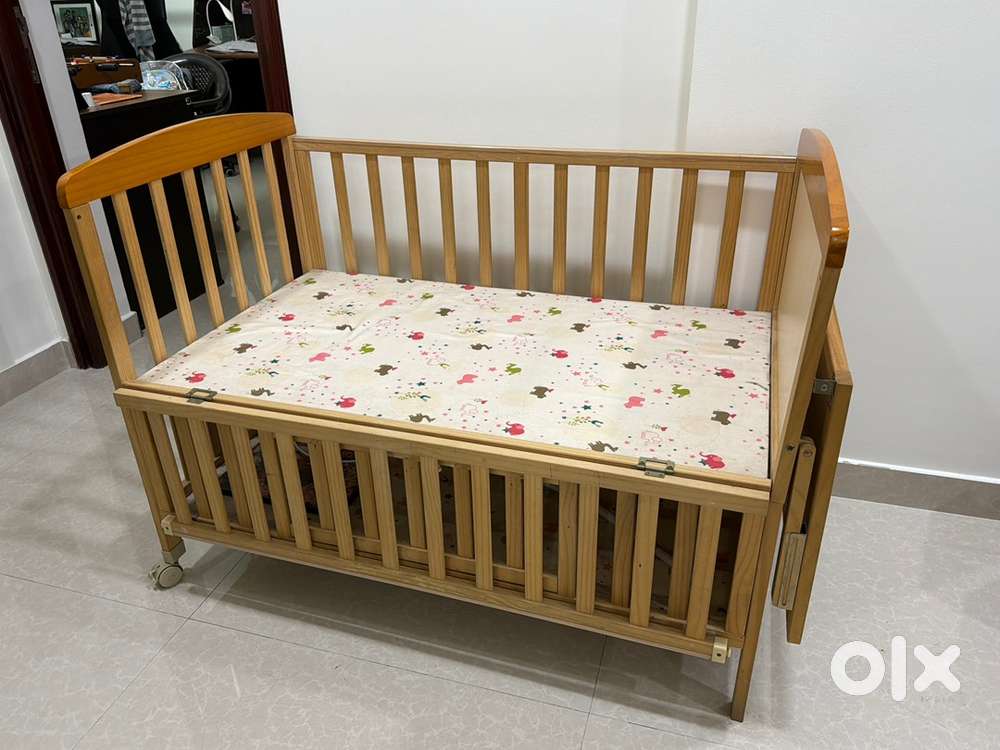 Wooden baby crib