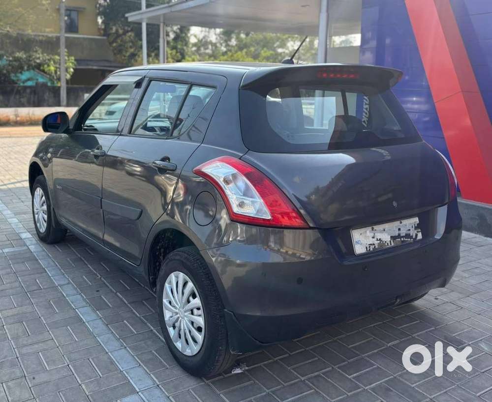 Maruti Suzuki Swift Lxi Optional-o, 2015, Petrol