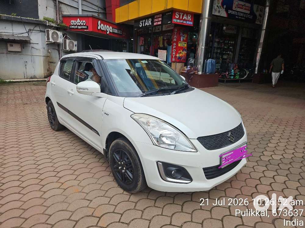 2016 Maruti Swift Vxi.