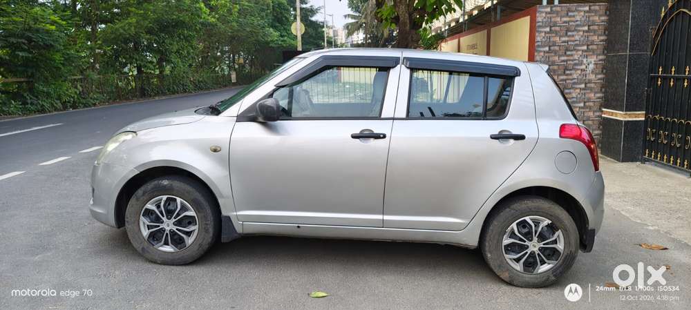 Maruti Suzuki Swift 1.2 Lxi (o), 2011, Petrol