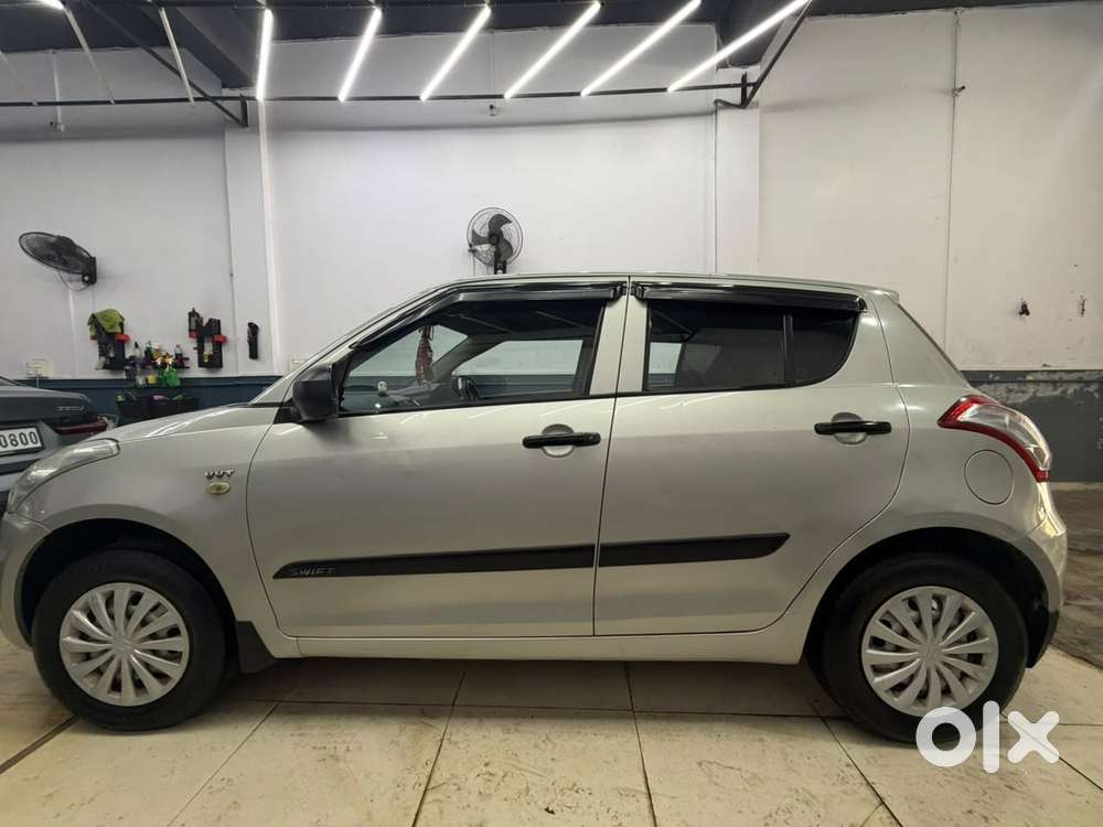 Maruti Suzuki Swift Lxi Optional-o, 2015, Cng & Hybrids