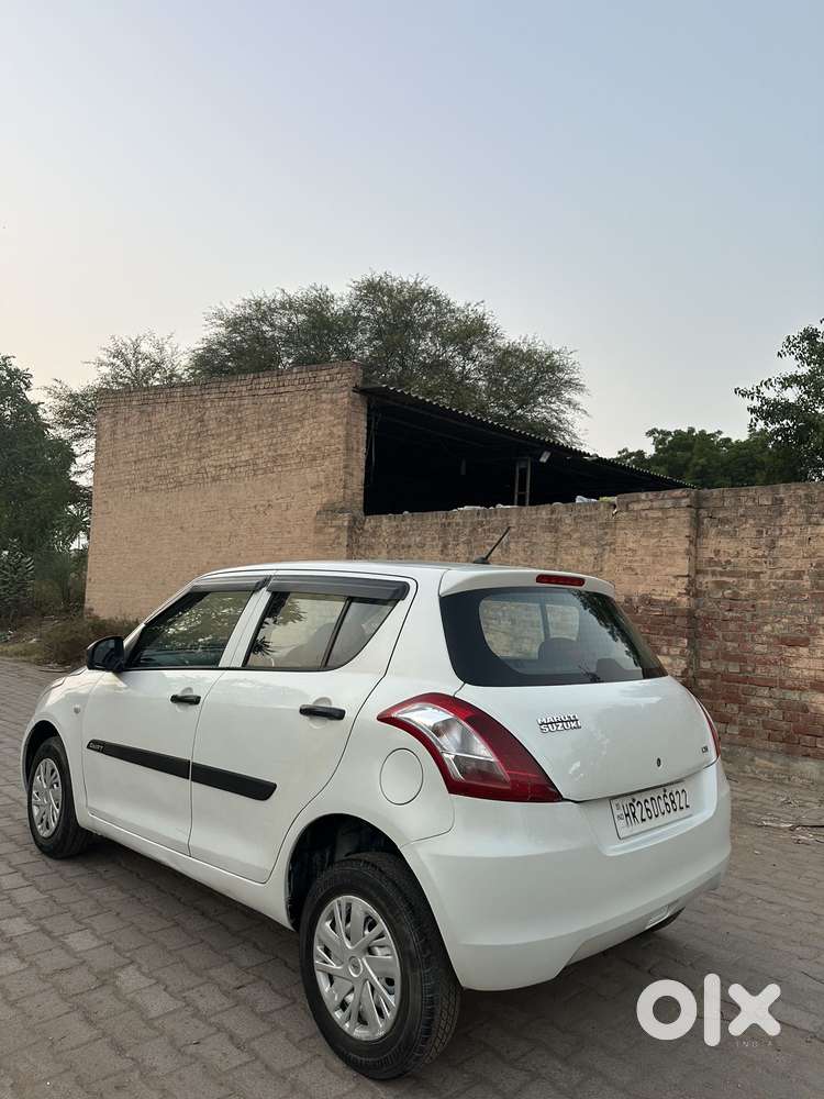 Maruti Suzuki Swift Lxi Optional-o, 2017, Petrol
