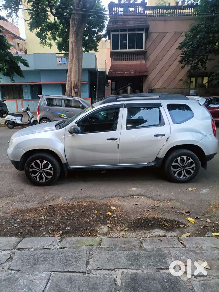 Renault Duster Rxe, 2013