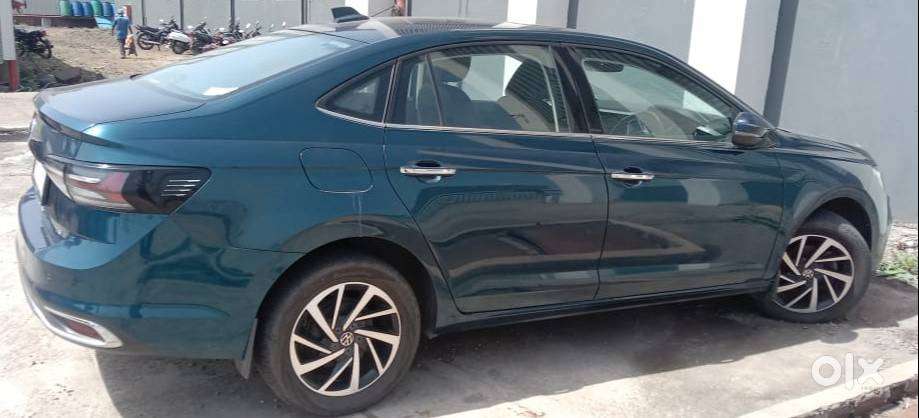 Virtus Petrol Auto 2023 Lava Blue Showroom Condition