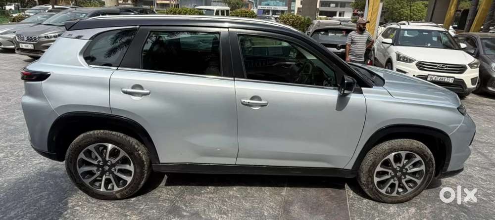 Maruti Suzuki Grand Vitara 1.5 Zeta Plus Dual Tone Intelligent Hybri..