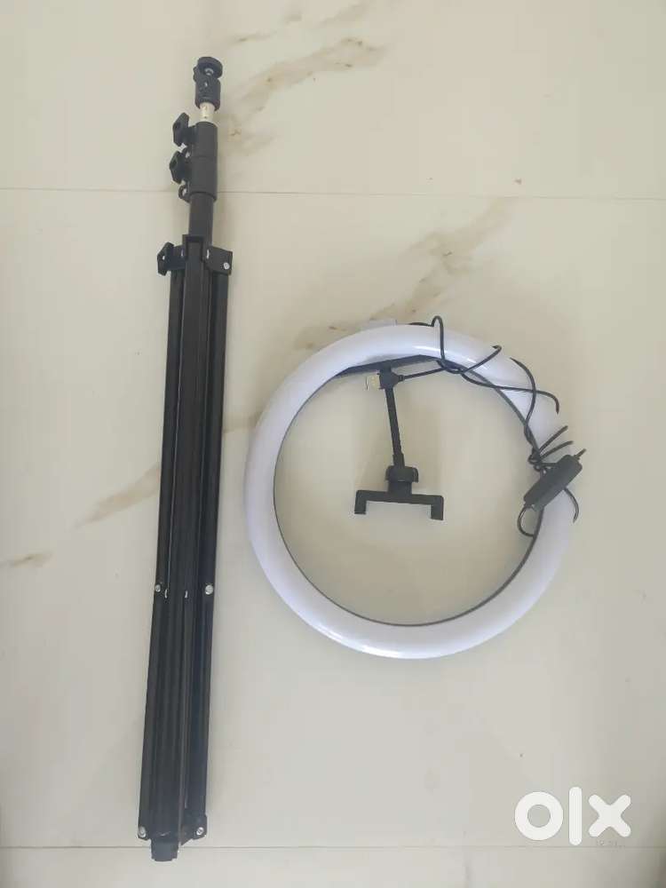 The brand new tripod with led ring light with box