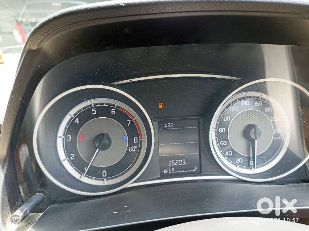 Maruti Suzuki Dzire ( Gallant Red). First Owner