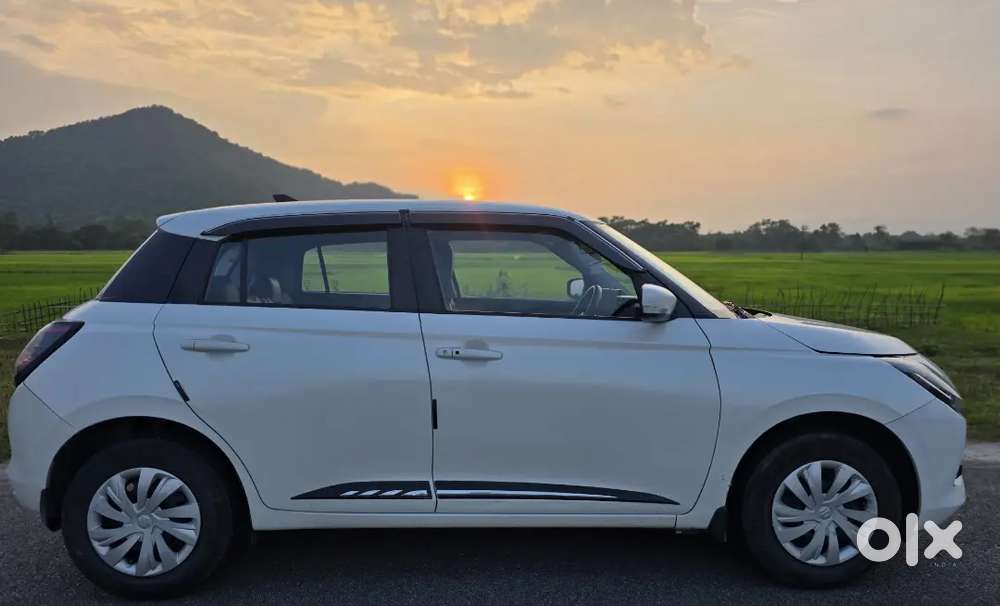 Maruti Suzuki Swift Vxi Optional  2024