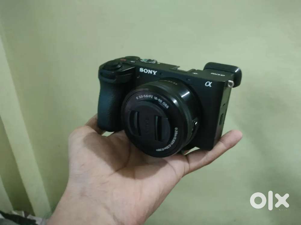 Sony A6700 with lens sigma 30mm 1.4 and kit lens