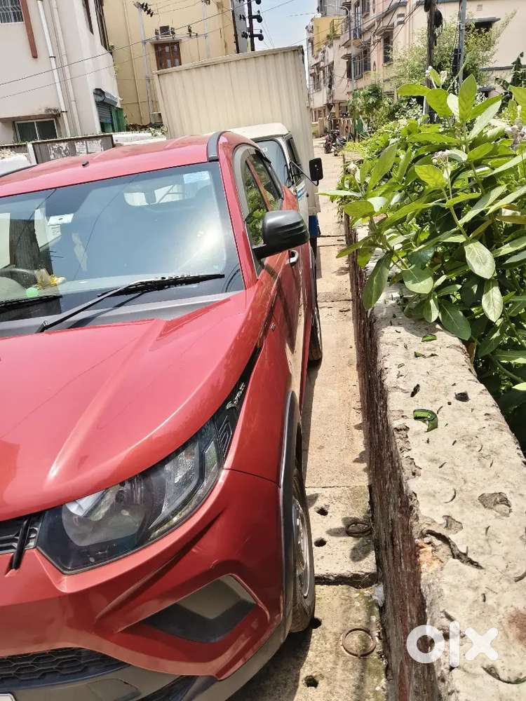 Well-maintained 2018 Mahindra Kuv100 K2 (red)