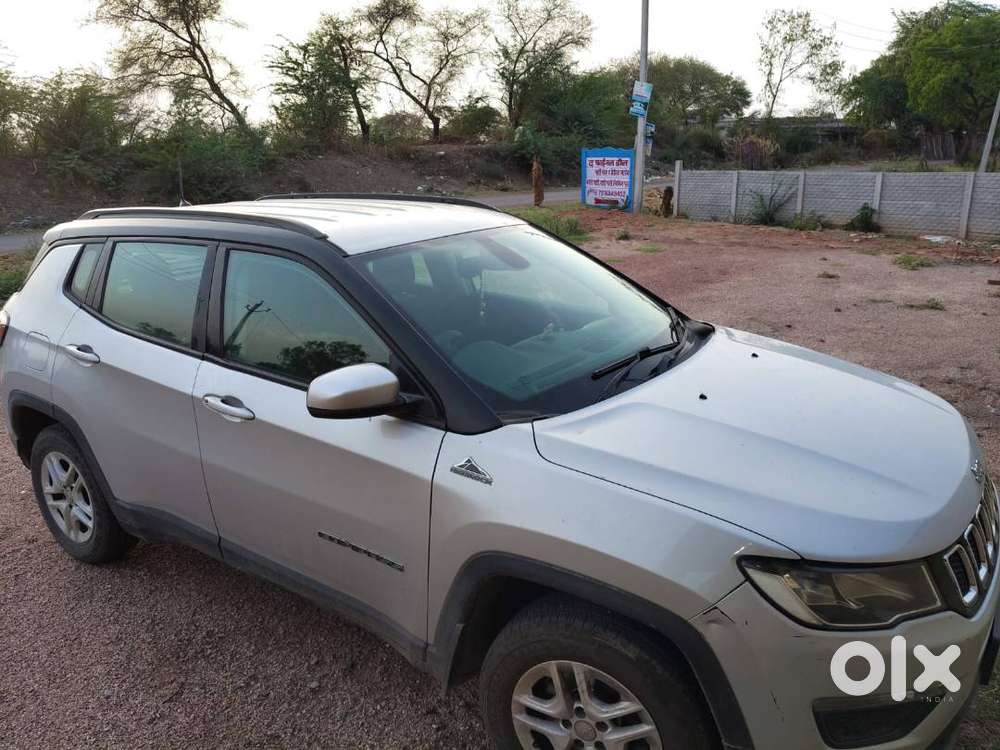 Bank Manager's Single Handed Silver Jeep Compass