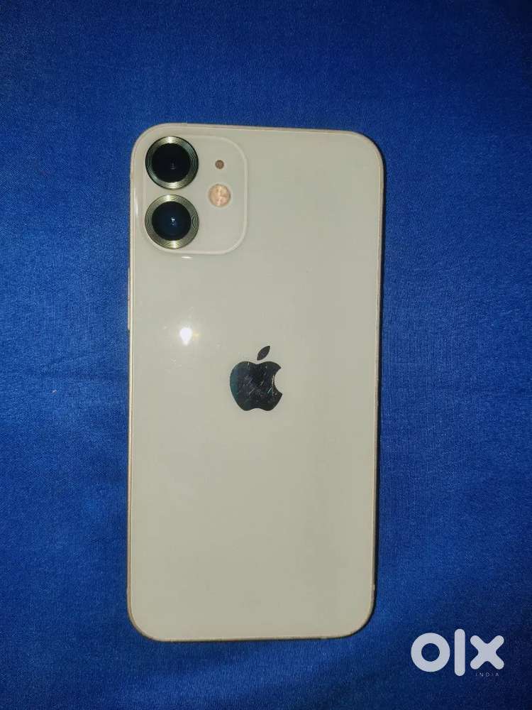 I phone 12 mini with box no issue no dent no scratches