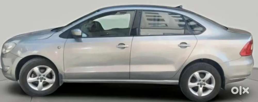 Skoda Rapid Elegance 2013 Petrol