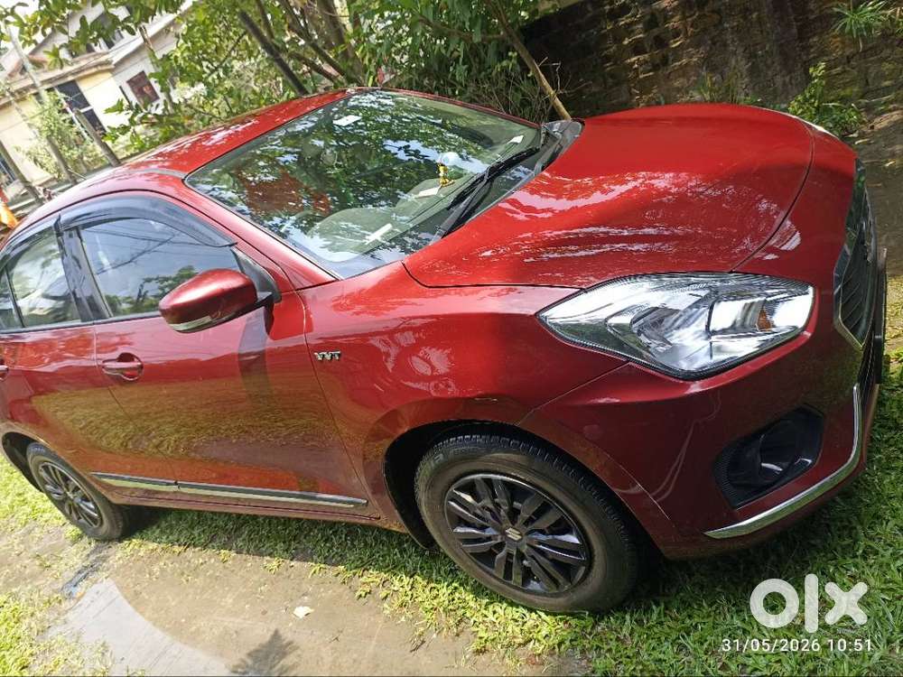 Maruti Suzuki Dzire ( Gallant Red). First Owner