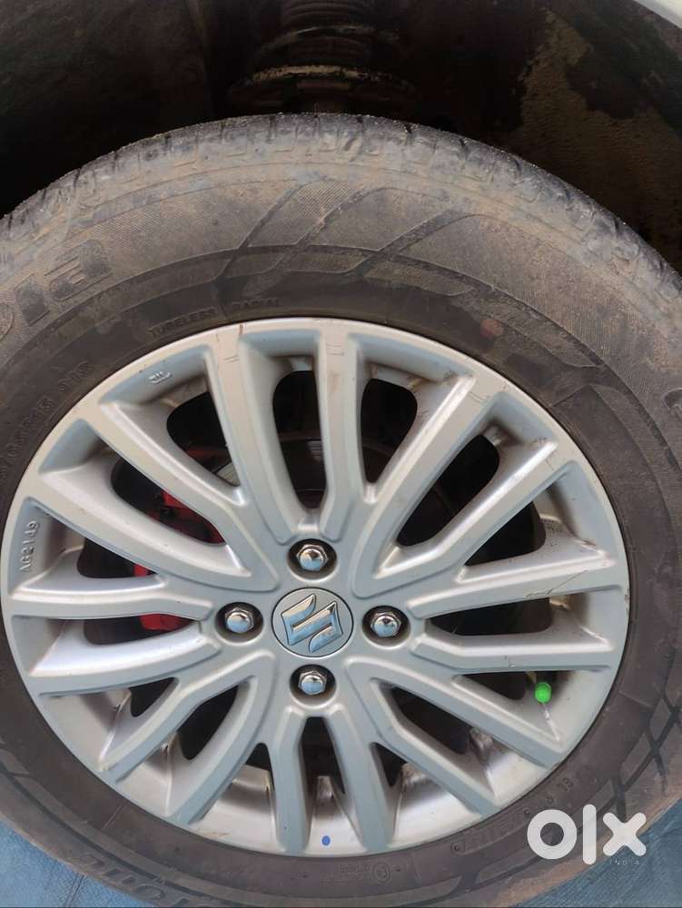 Dzire Zxi With Star Stop Button And Alloy Wheels And Keyless Entry