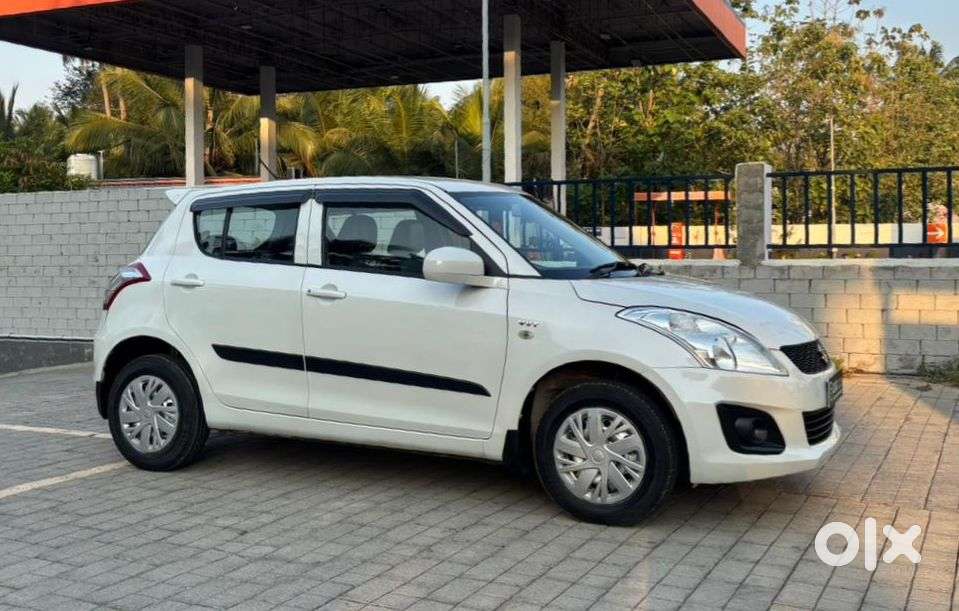 Maruti Suzuki Swift Lxi Optional-o, 2015, Petrol
