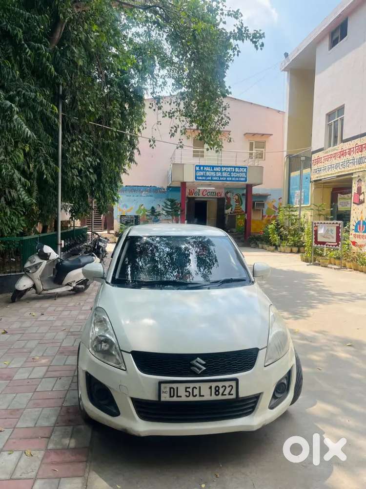 Maruti Suzuki Swift Lxi 2015
