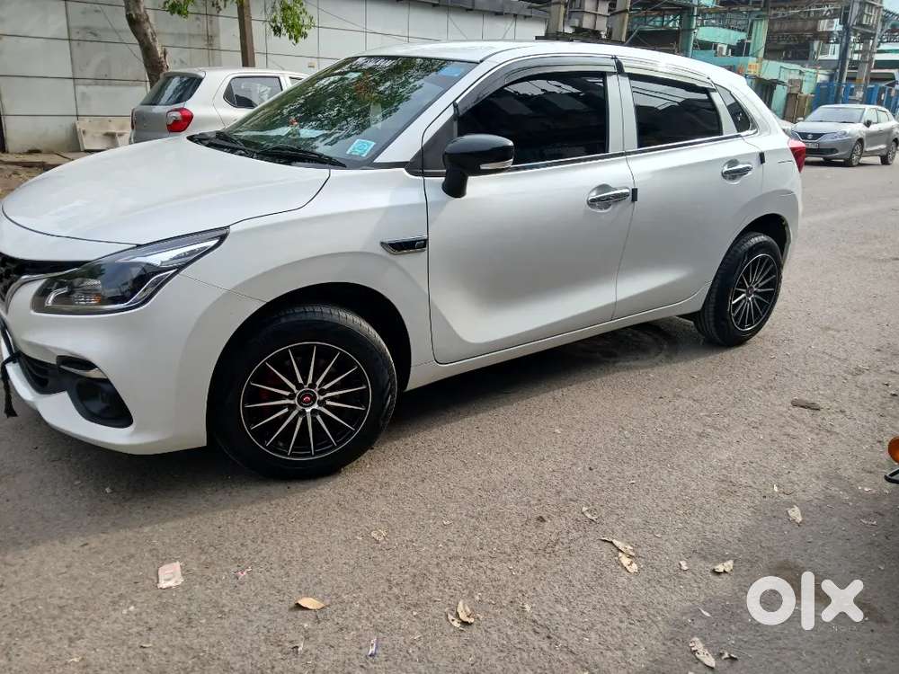 Baleno 2023 Petrol 1st Owner White Alloy Wheels Led Light Music System