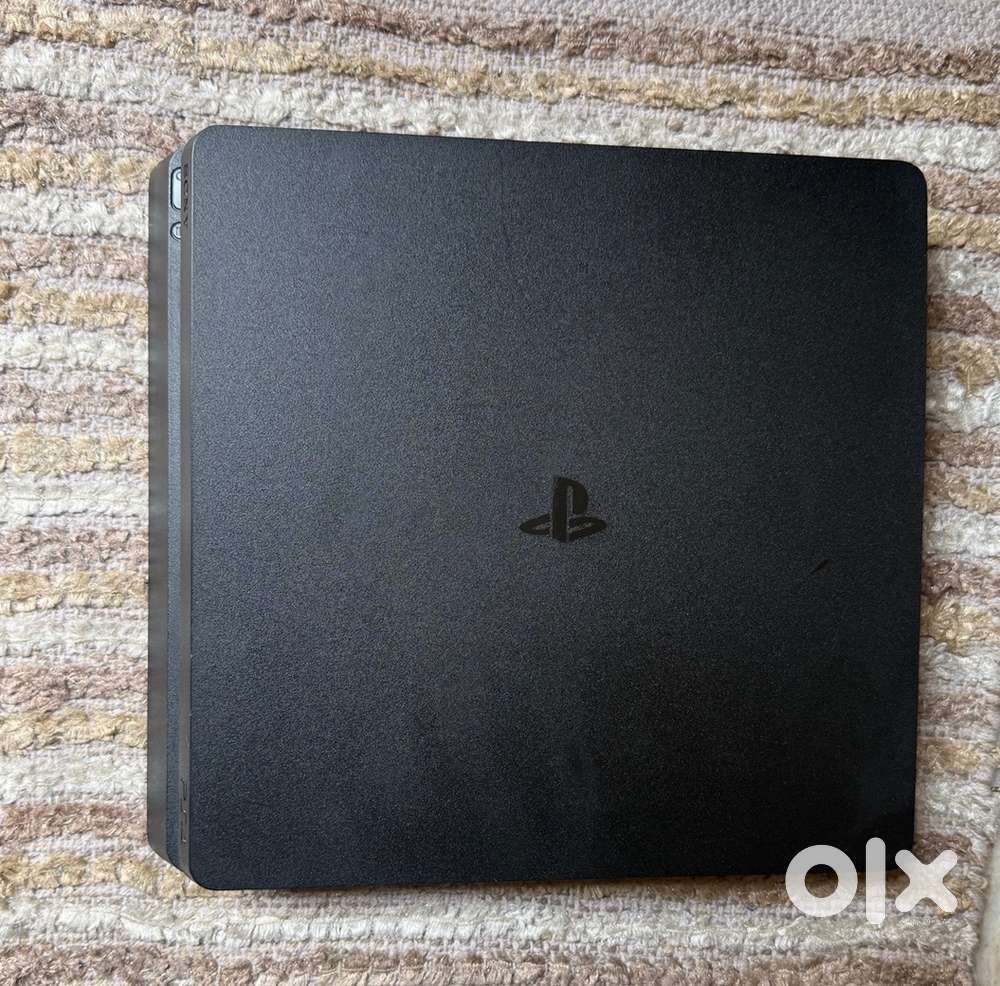 Playstation 4 slim 1tb with warranty
