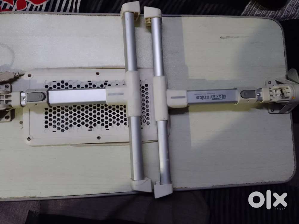 Portronics laptop table with fan