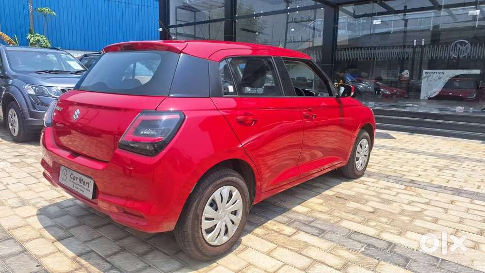 Maruti Suzuki Swift Vxi + Manual, 2026