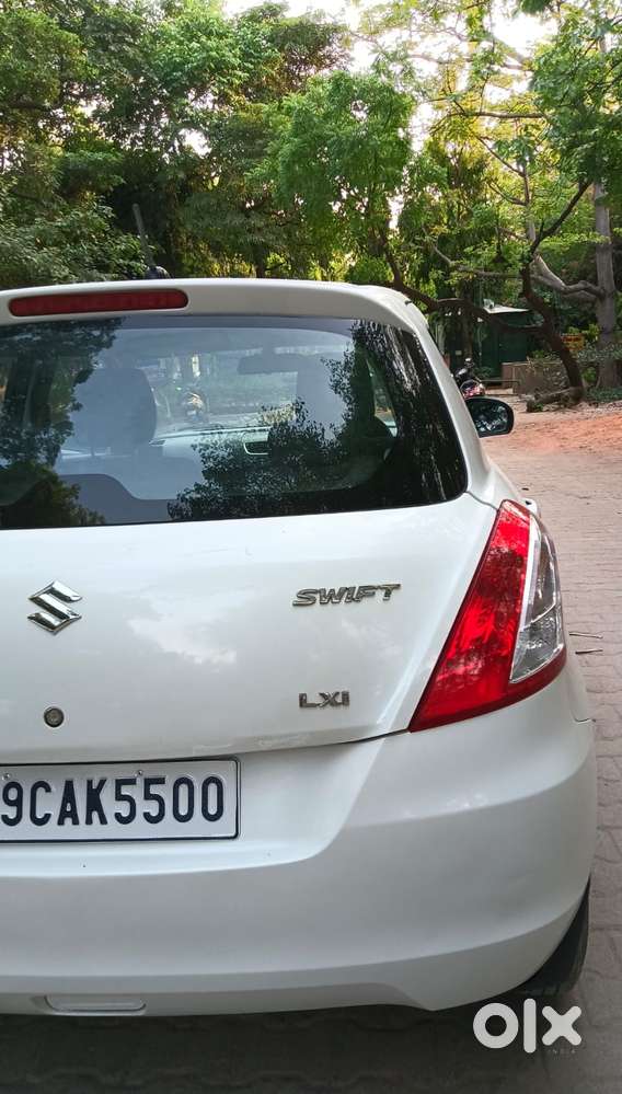 Maruti Suzuki Swift Lxi Optional-o, 2015, Petrol