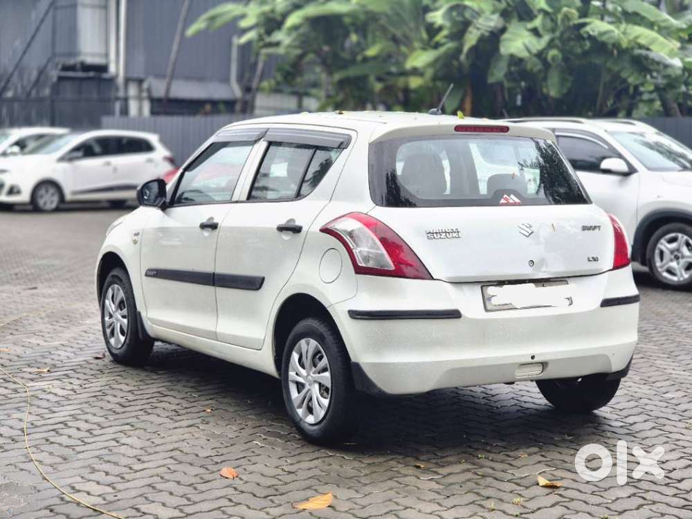 Maruti Suzuki Swift 1.2 Lxi (o), 2015, Petrol