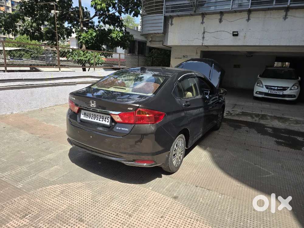 *honda City 
*1.5 Sv Mt(idtech)  1.5 S Mt
* 2014
* 9.3 K
* G Brown M
*