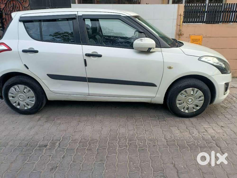 Swift Petrol 2015 Pearl White