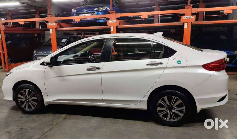 White Honda City Regd. On 11.01.2019