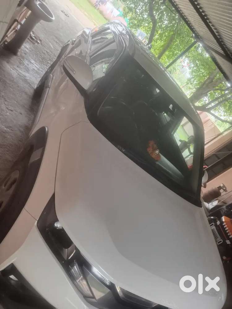 Maruti Suzuki Brezza Vxi 2025