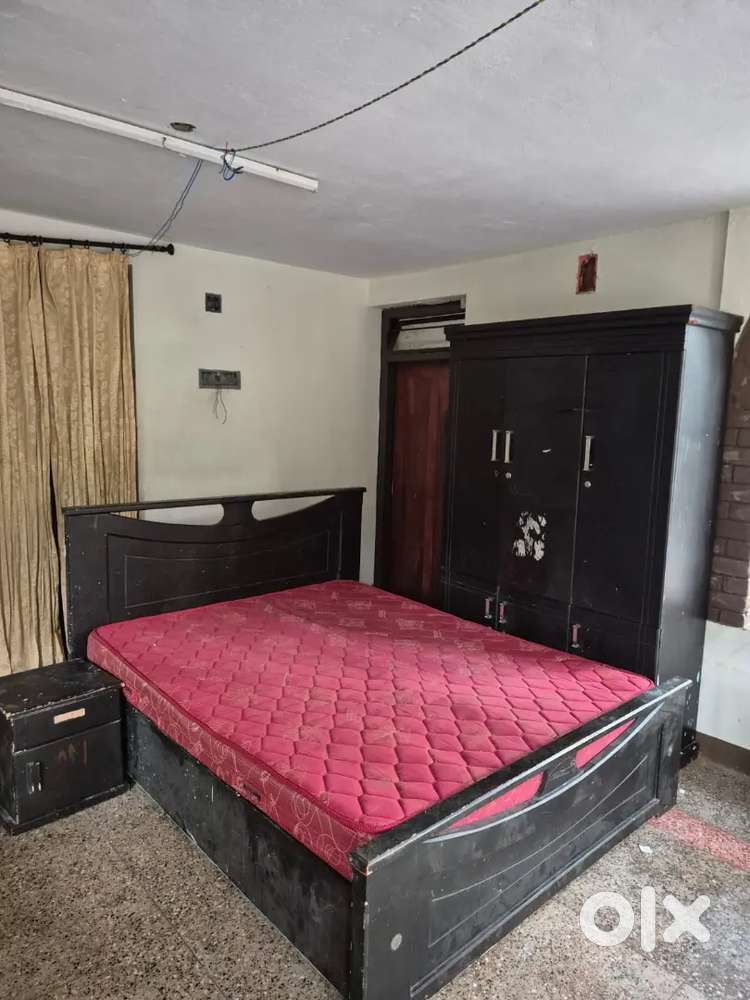 Wardrobe and bed with mattress
