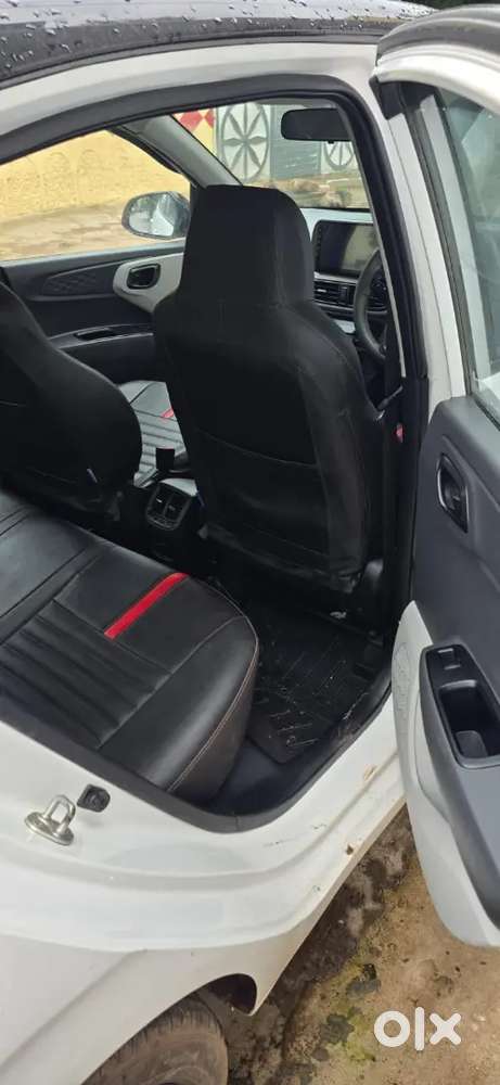 Hyundai Grand I10 Nios 
Sports Variant
Colour White/black
Cg 04 Passin