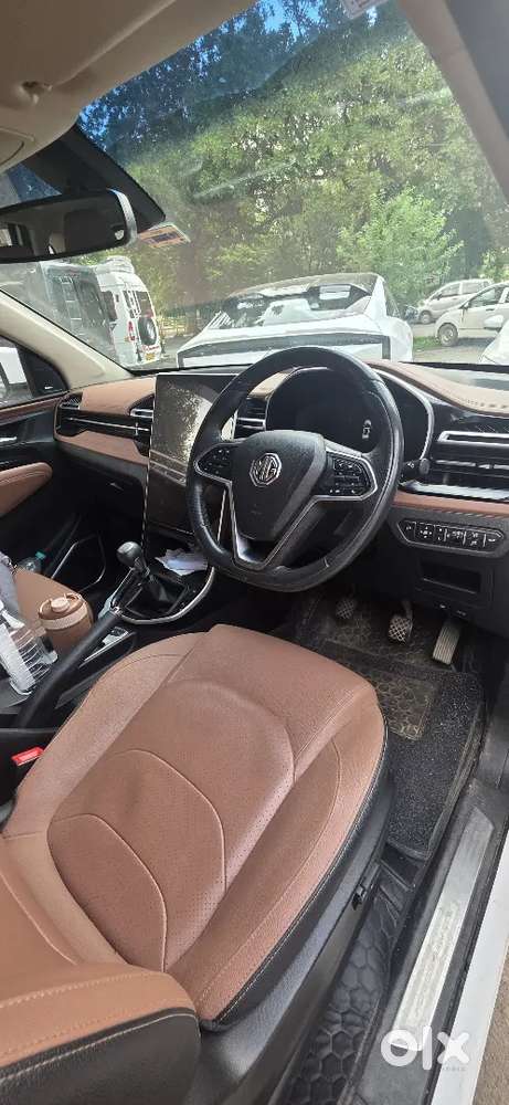 Six Seater Petrol Manual,  Less Driven,top Model