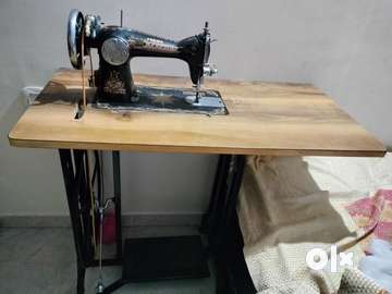 Sewing machine deals with table olx