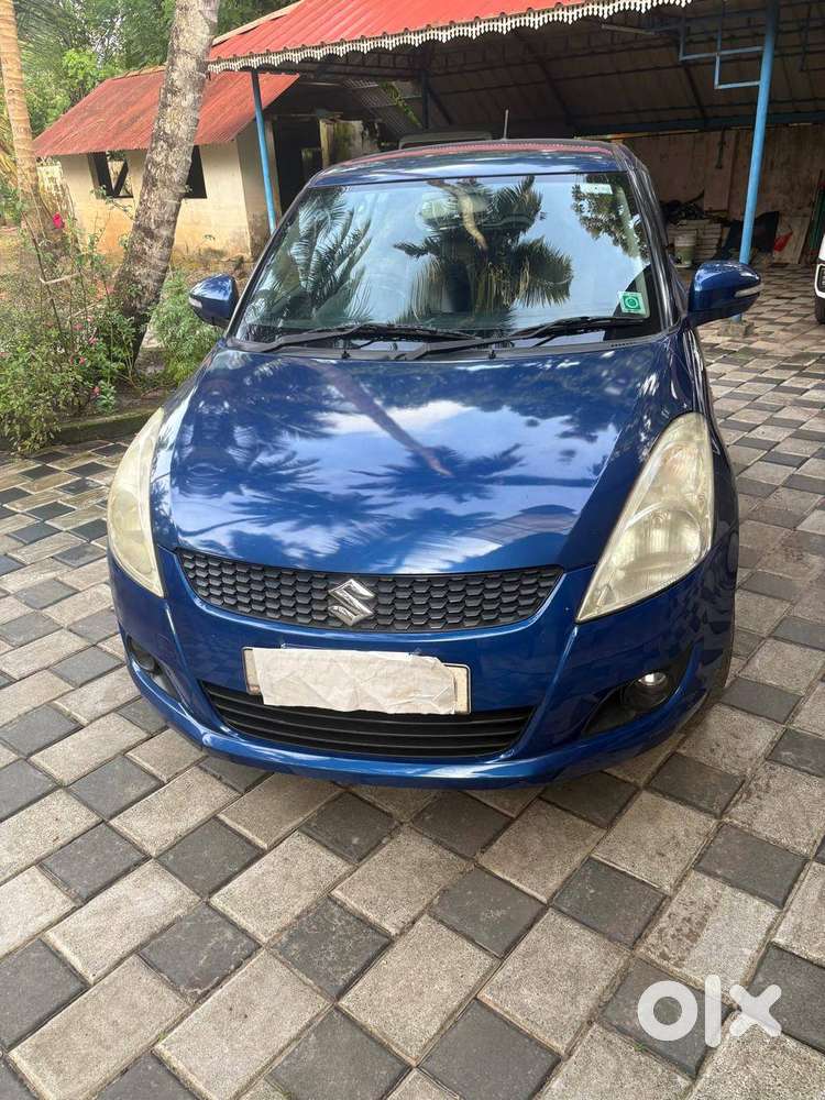 Well-maintained Maruti Swift 2012 (blue)  2l Km  Pristine Condition
