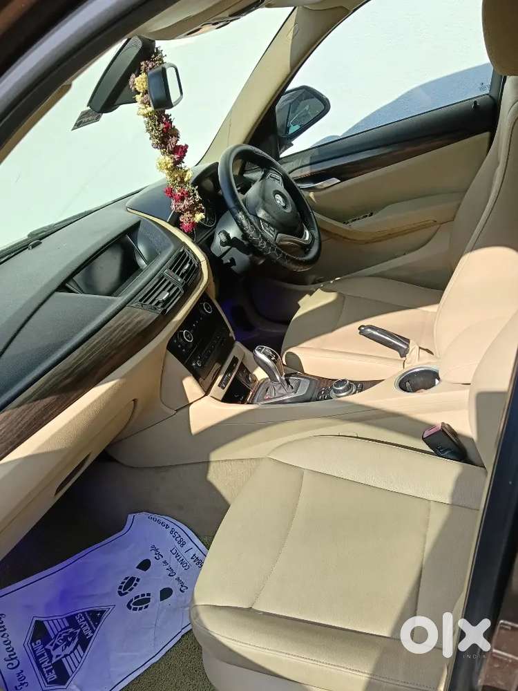 Bmw X1 2015  Rs.12,50,000/-  Registration Brown Colour 2nd Owner