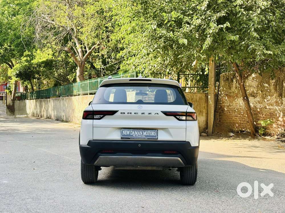 Maruti Suzuki Brezza 1.5 Lxi Smart Hybrid, 2024, Petrol