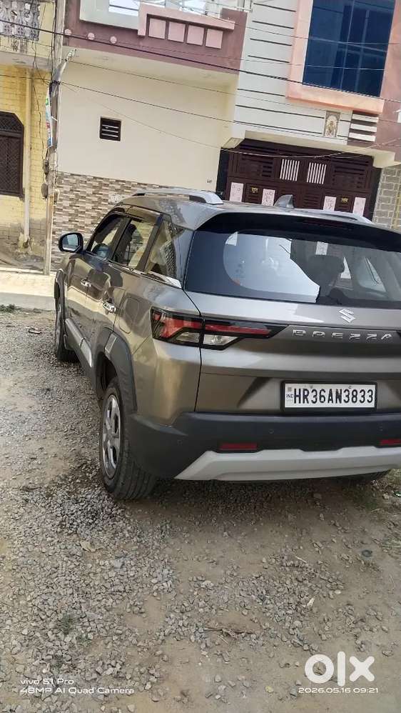 Maruti Suzuki New Brezza 2023. My Car Insurance Feb. 2027.