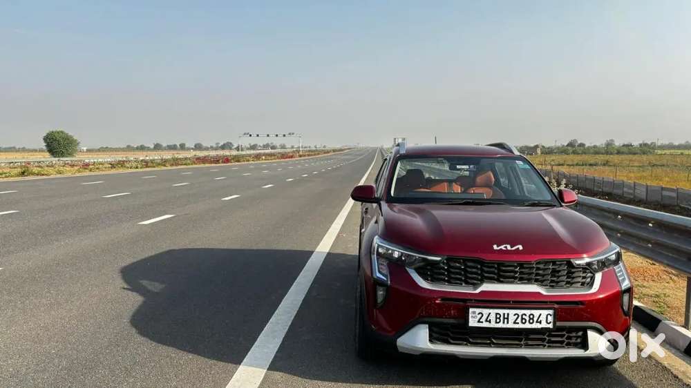 Kia Sonet Red 2024 Petrol Well Maintained With Bh Number Plate.